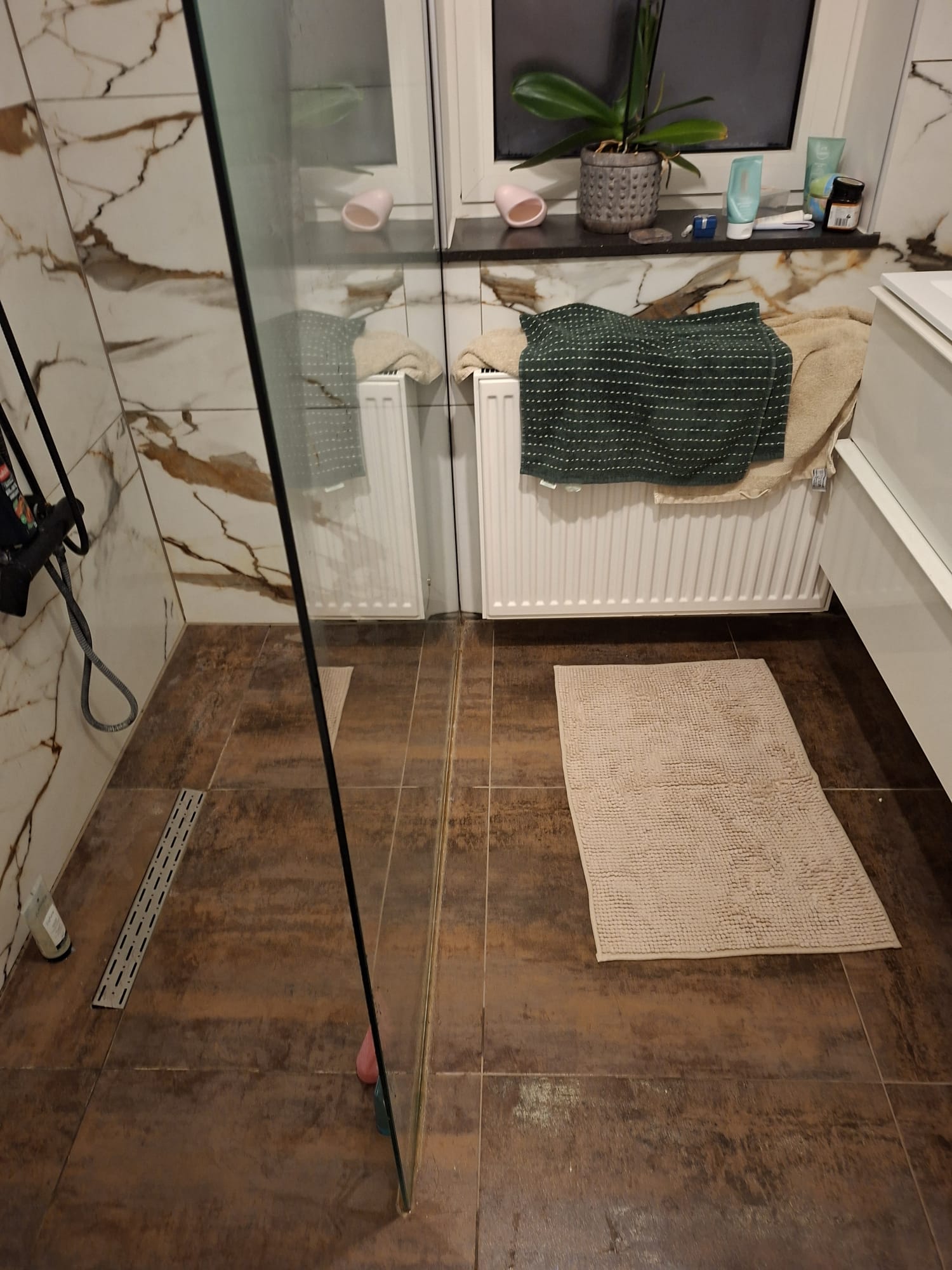 Baño terminado con mampara